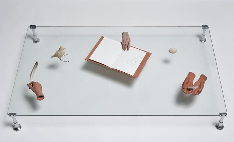 이산오_무겁고 가벼운 것들, 2023, 석기에 색연필, 나무, 깃털, 유리, 종이에 인쇄, 가변크기
