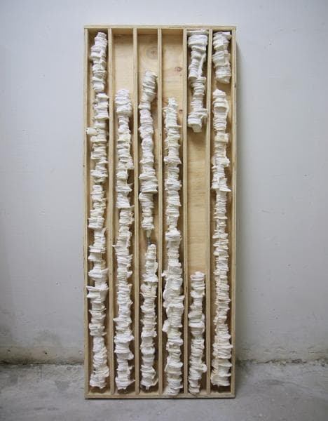 김원진, The Chronicles of Today - drilling, 120x50x7cm, 책을 파내고 네가티브 캐스팅, 나무 (Casting negative space after scraping book out), 2016